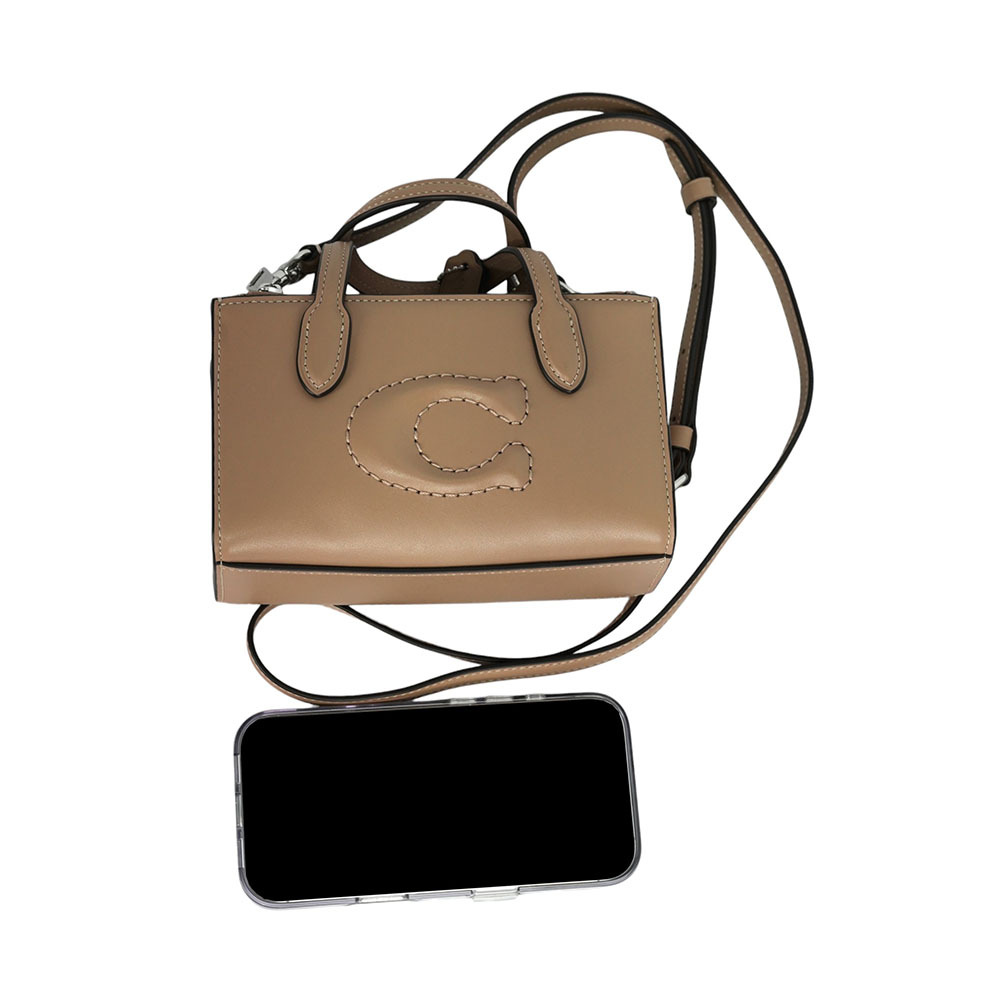 【COACH】Nina 銀釦縫線標誌小牛皮迷你手提/斜背二用包(奶茶色)CT804 SVTP