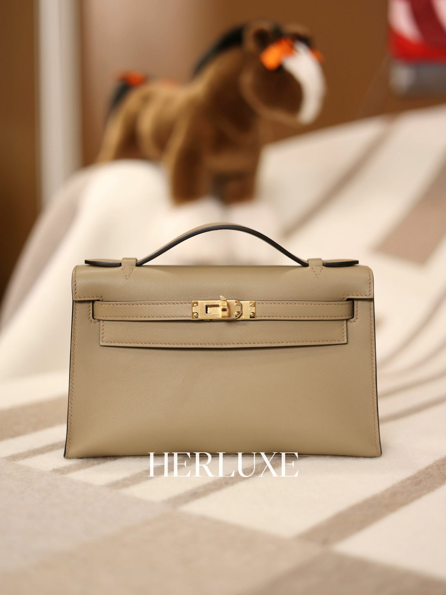 Kelly pochette 8Q beige marfa  cc swift w