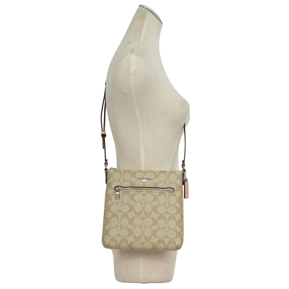 【COACH】Rowan 塗層帆布及再生皮革拉鍊迷你斜背包(淺卡其/粉橘色)CS182 SVX1W