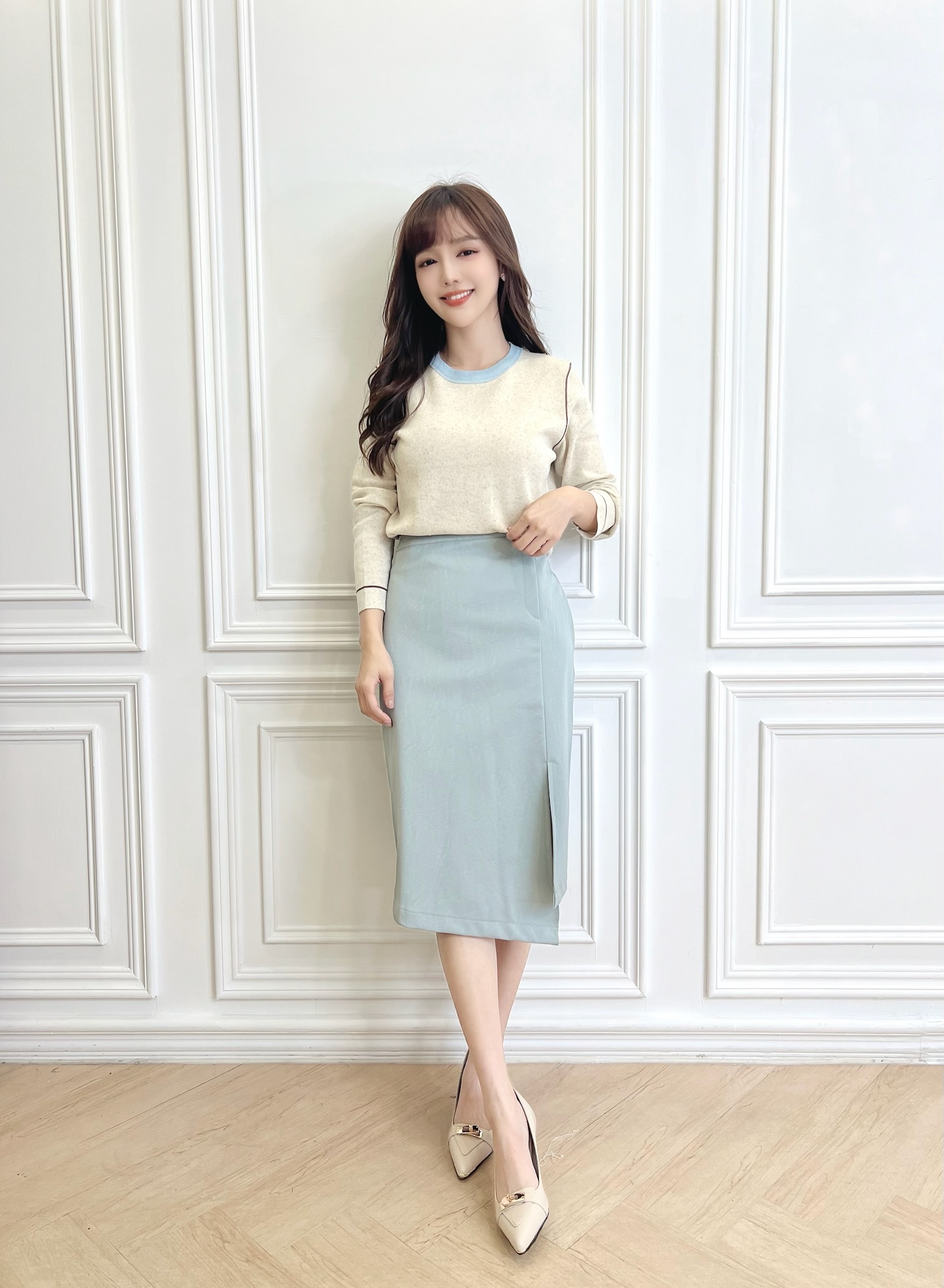 側銀釦開衩蛋白皮開衩下擺裙