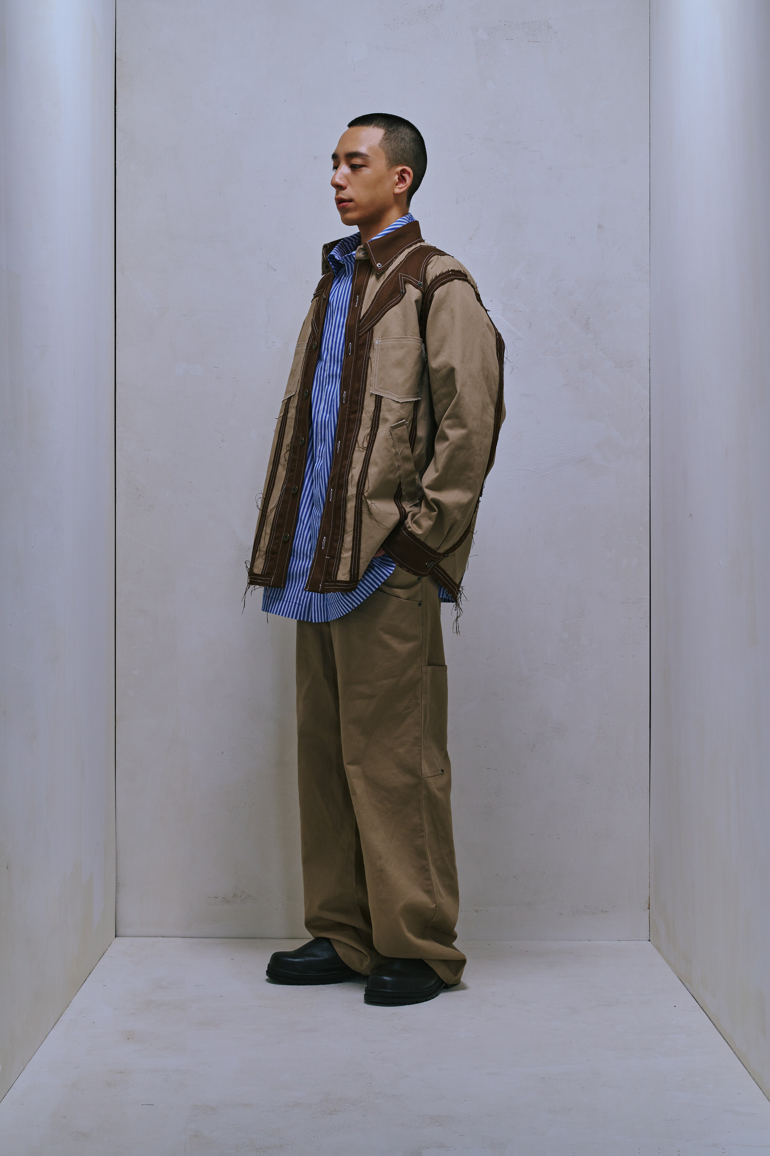 PATCHED “RAW-CUT” SHIRT JACKET