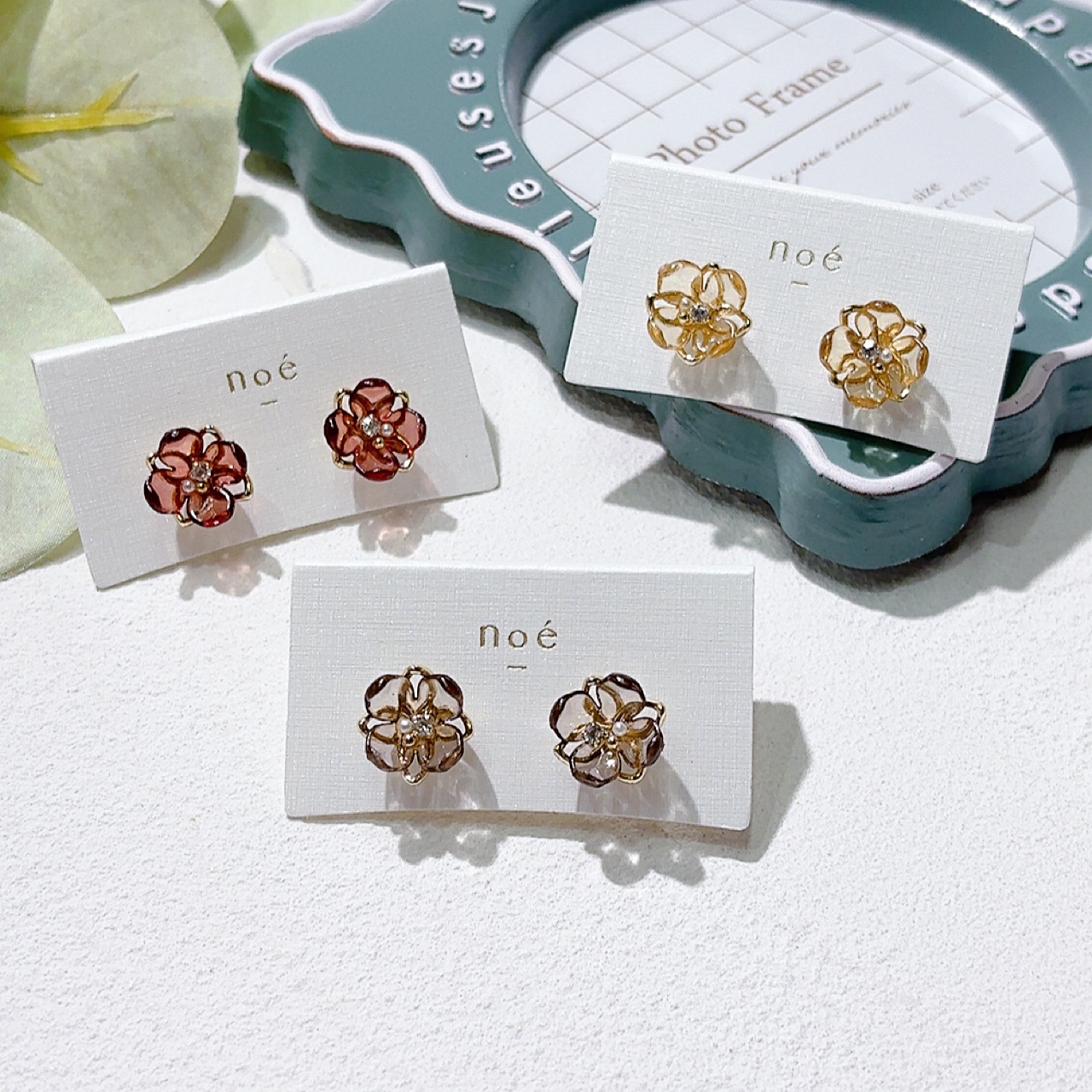 透明感花形耳環