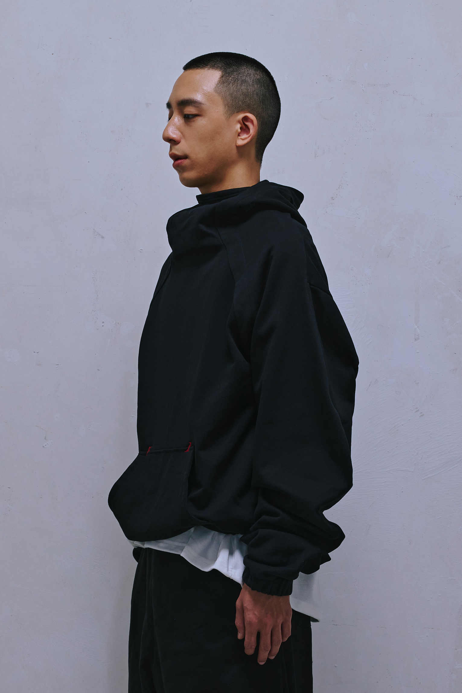LONG-SLEEVE “WEIRD” HOODIE