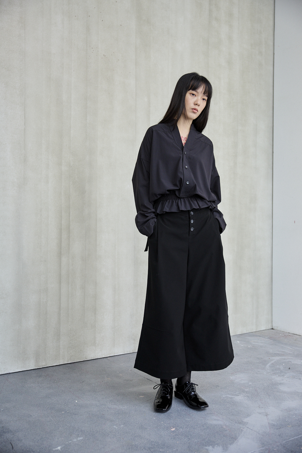 束腰設計後鏤空長褲