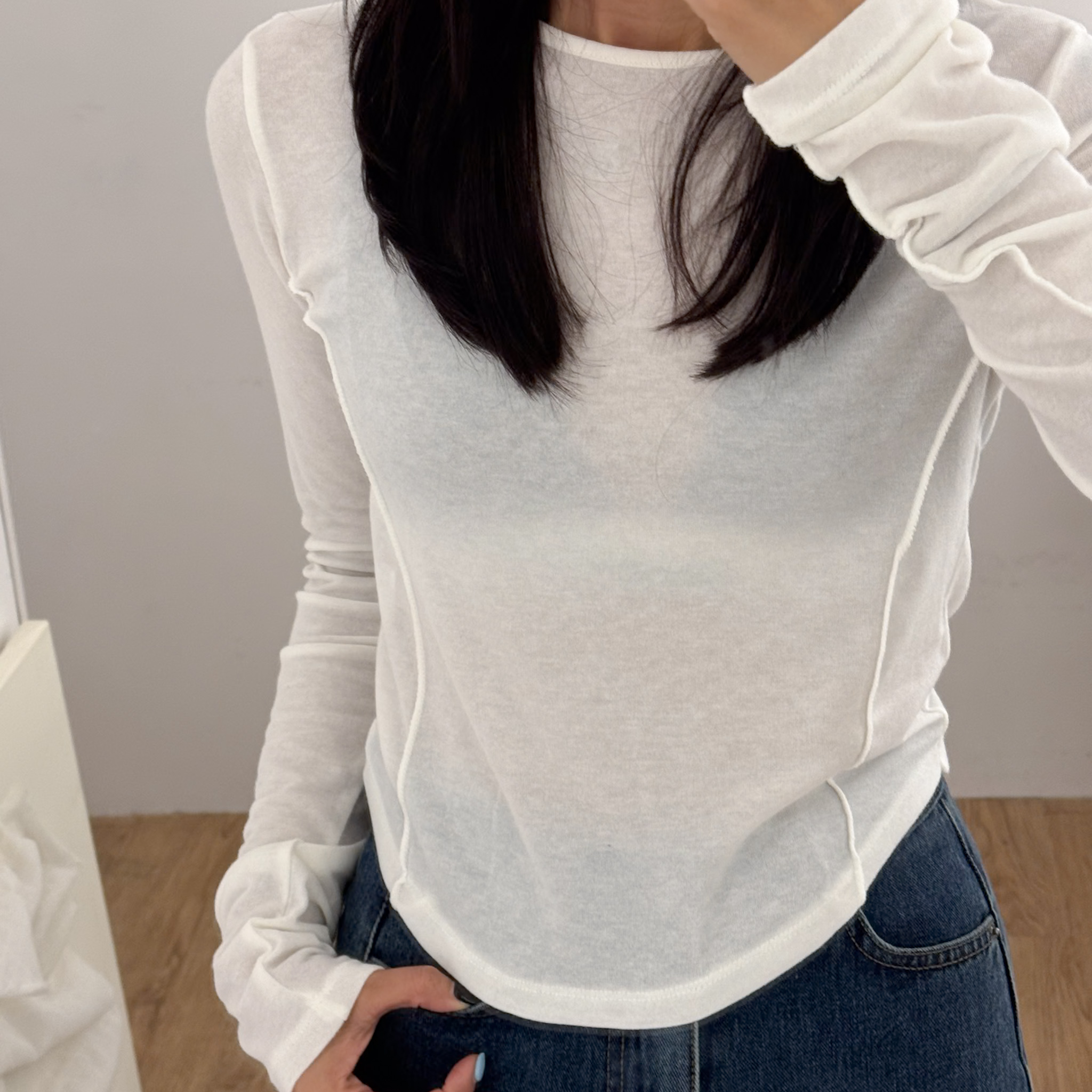 N35圓弧下擺前車線長袖上衣(米-架上陳列)