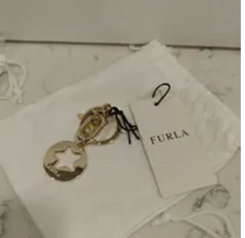 [S] FURLA WR00656-MES000-3108S CRYSTAL KEYRING STARFISH METALLO,GIALLO CEDRO, 8050597462479 (SF288)