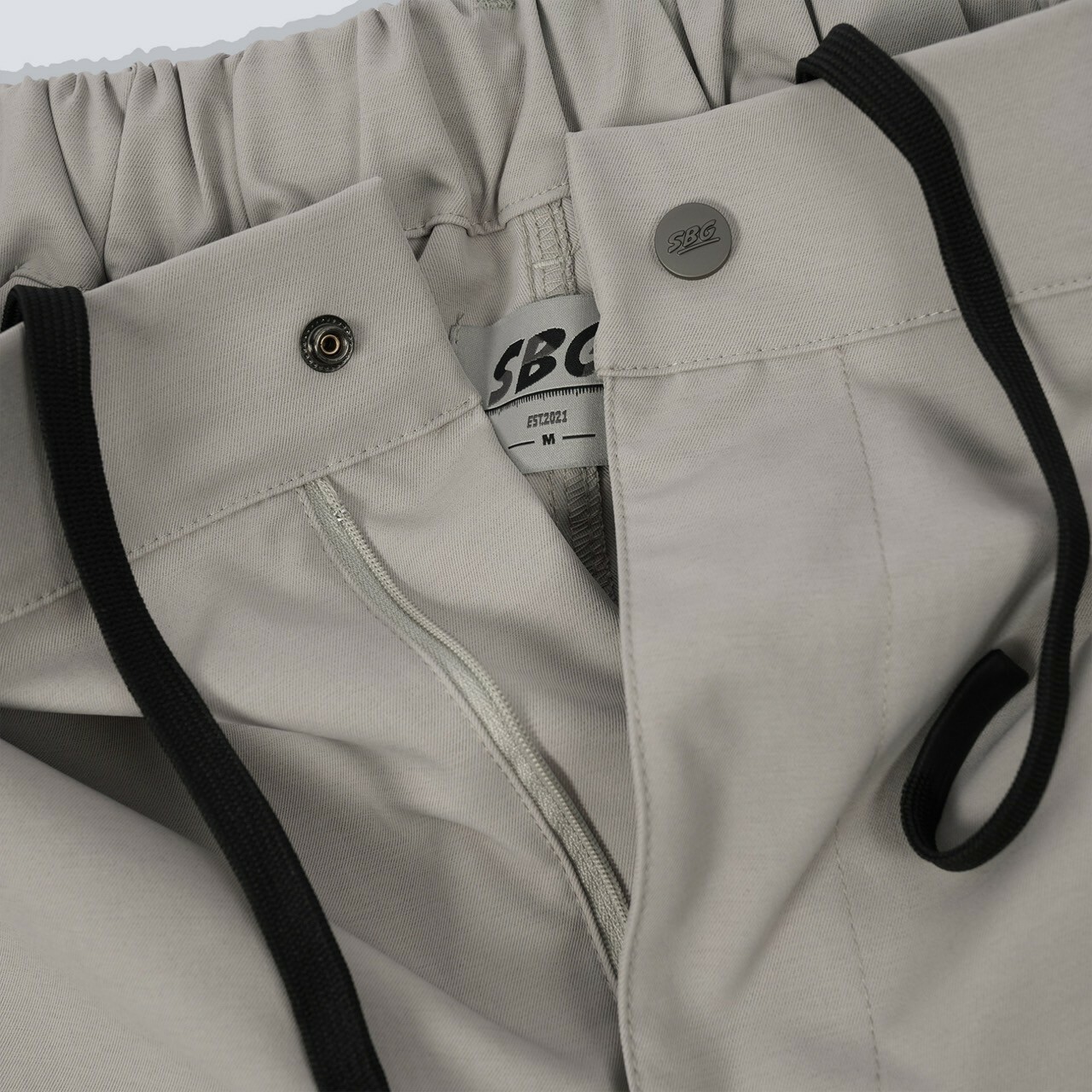 #2024 質感彈性修身長褲米灰褲頭細節照