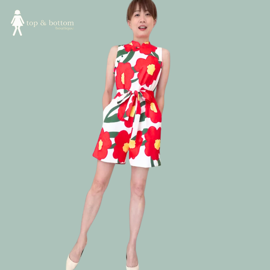 SOLID BIG FLOWER PRINT SHORT JUMPSUIT