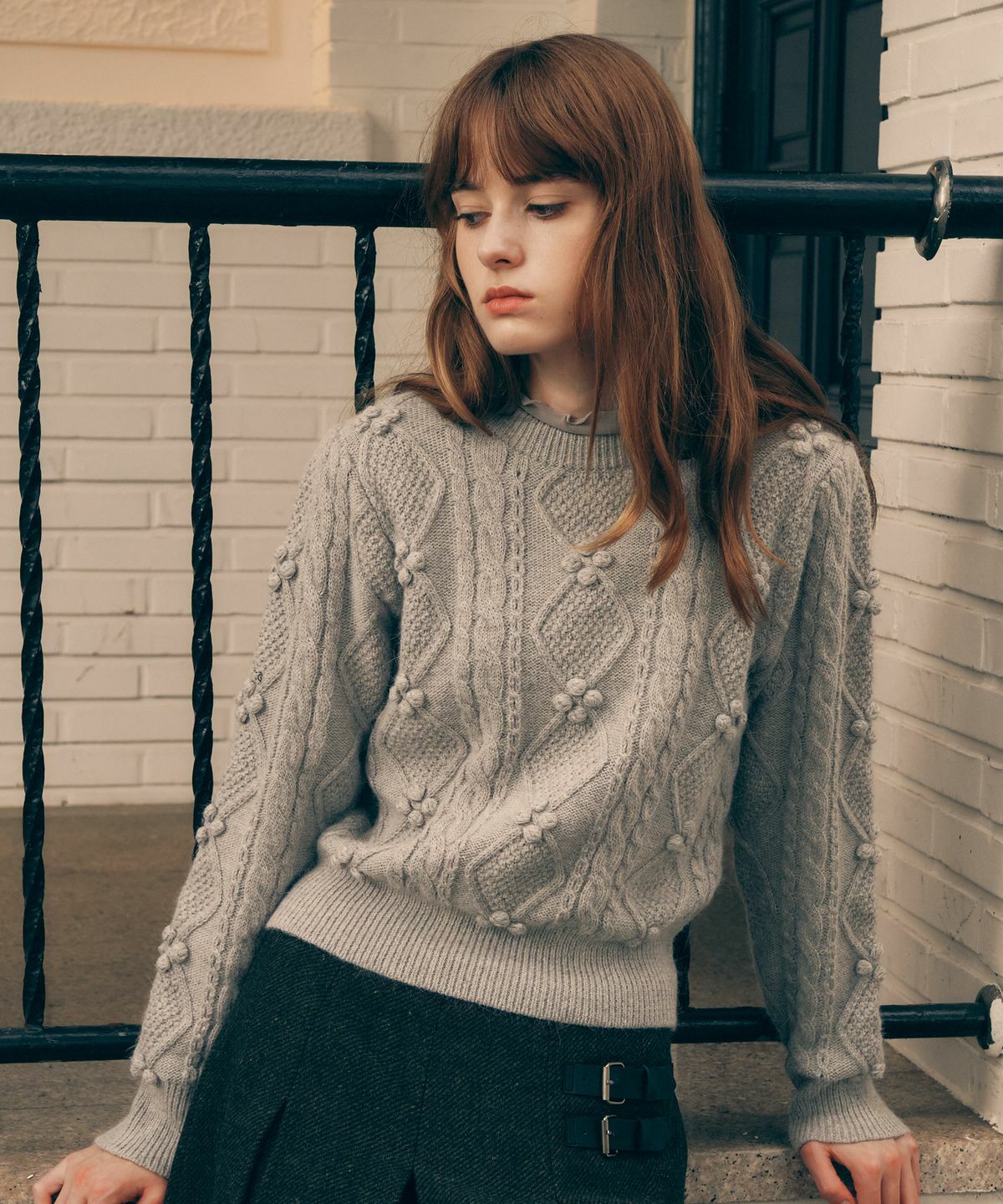 ROLAROLA POMPOM CABLE KNIT