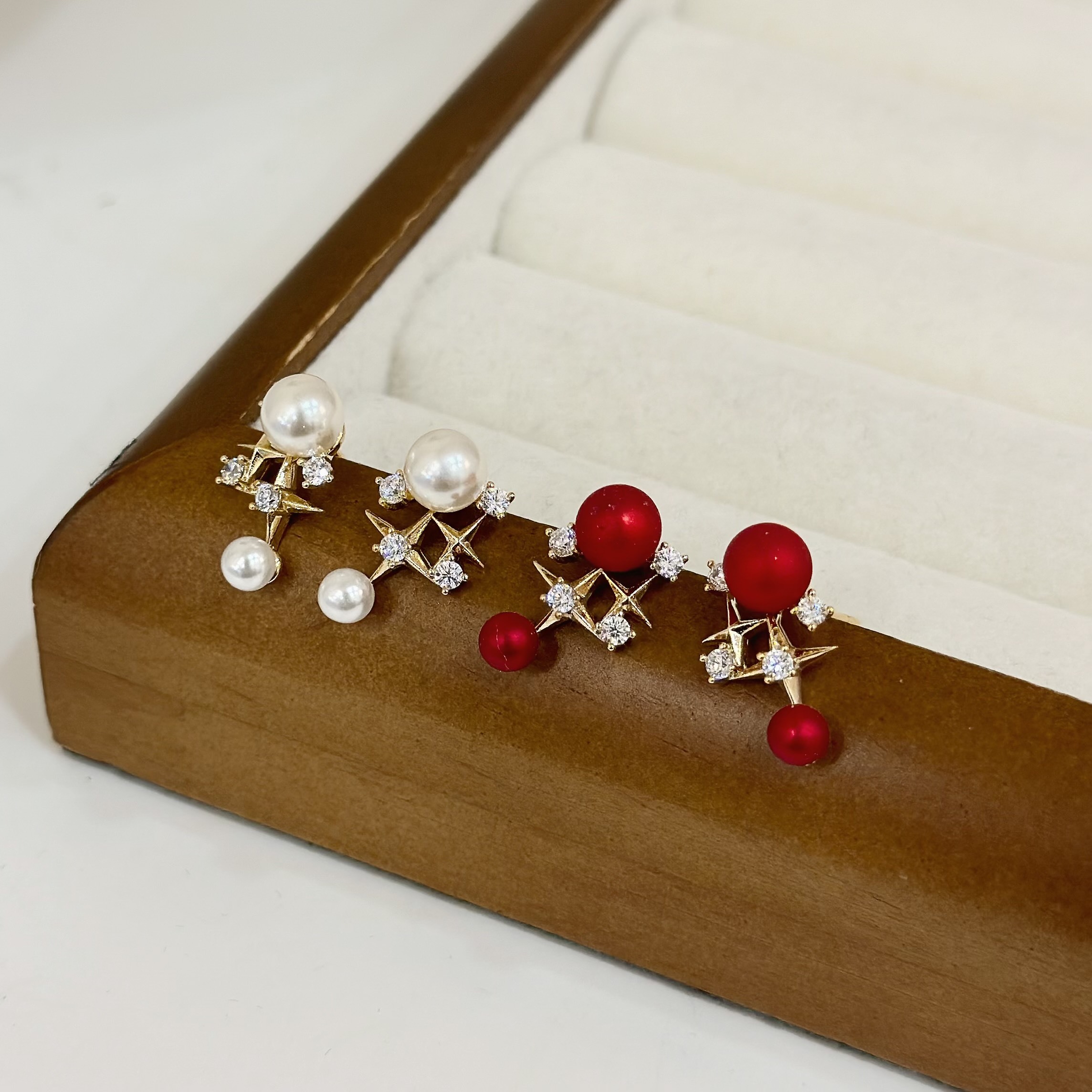 R111排鑽星芒珍珠耳針