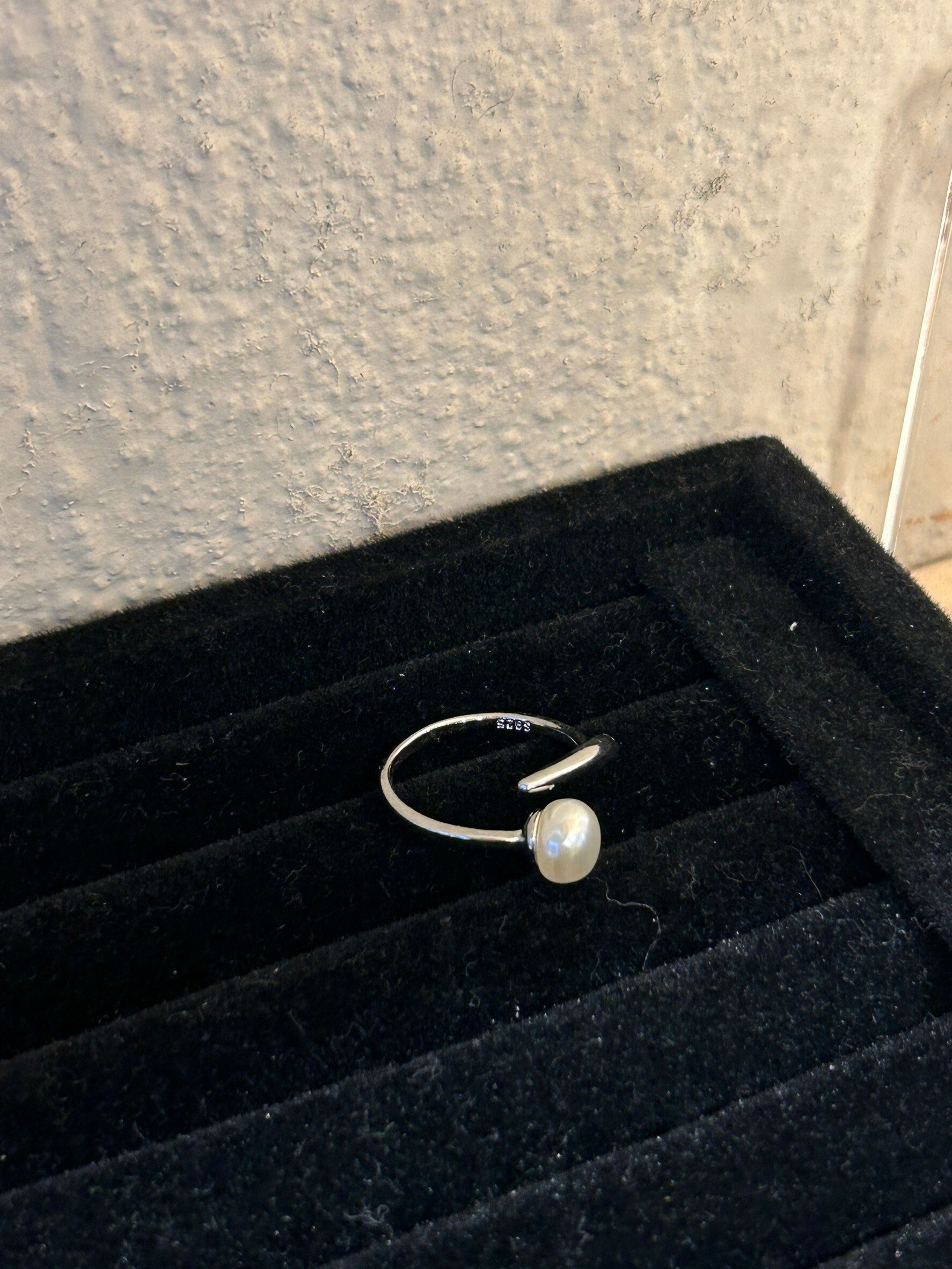 [LAUGHTER] pearl arrow ring
