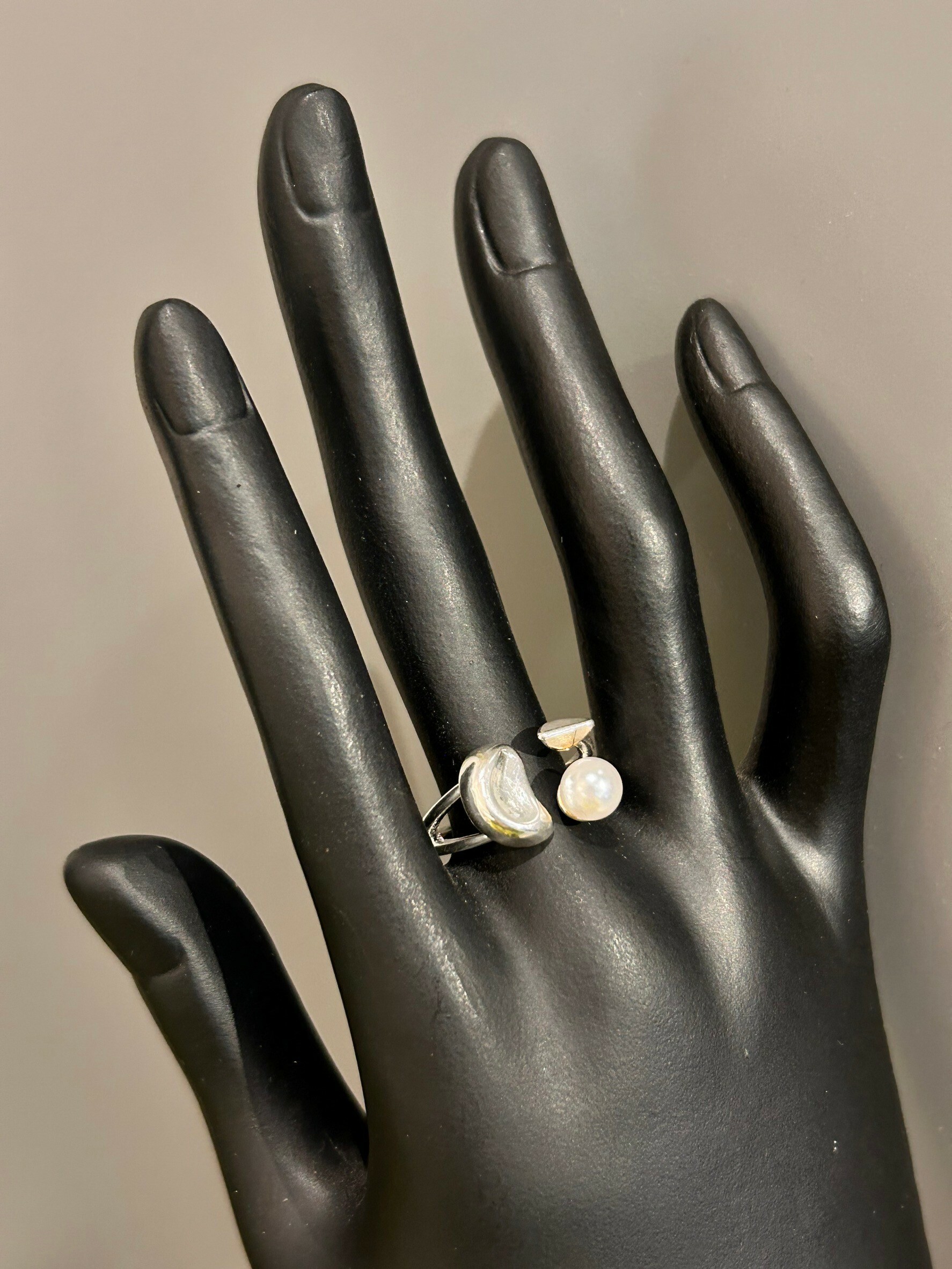 [LAUGHTER] pearl knot ring