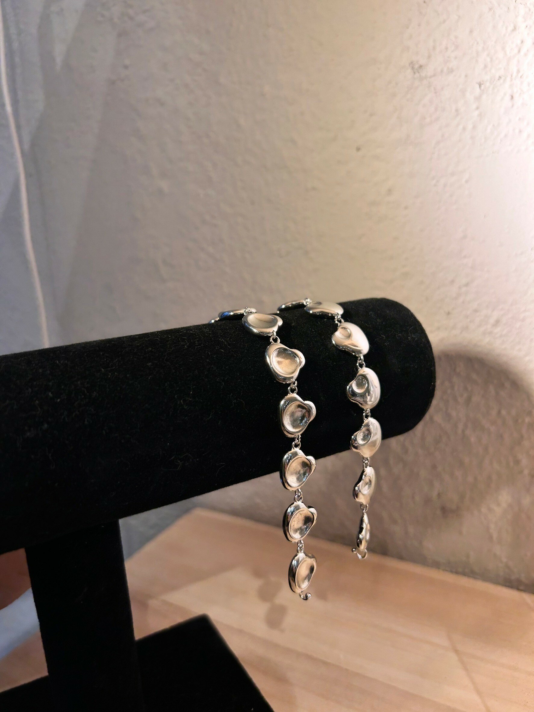 [LAUGHTER] beans metal bracelet