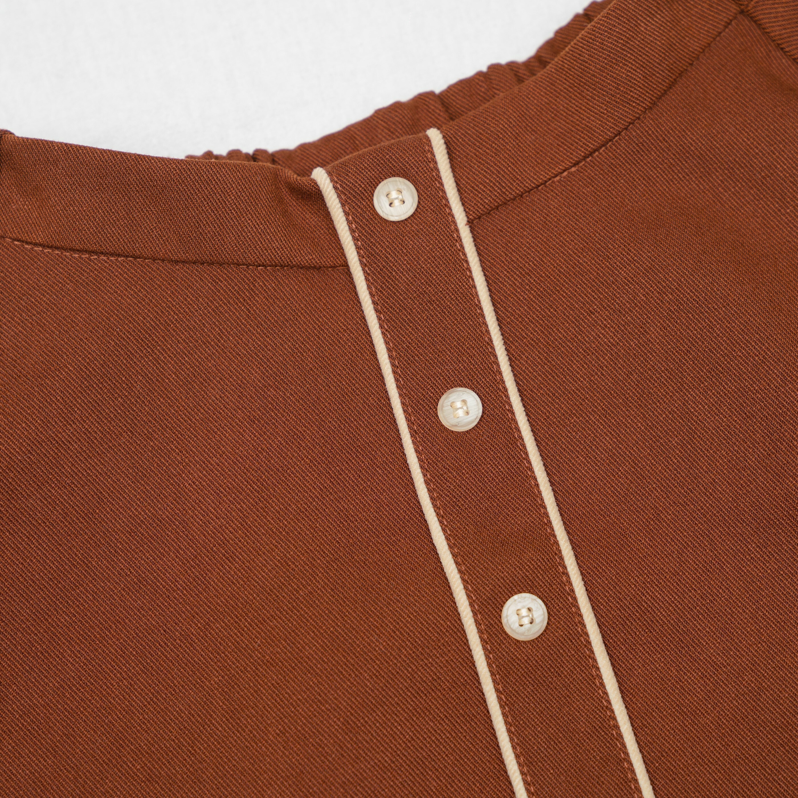 秋款優雅排扣Ａ字短裙(焦糖色)-假扣子