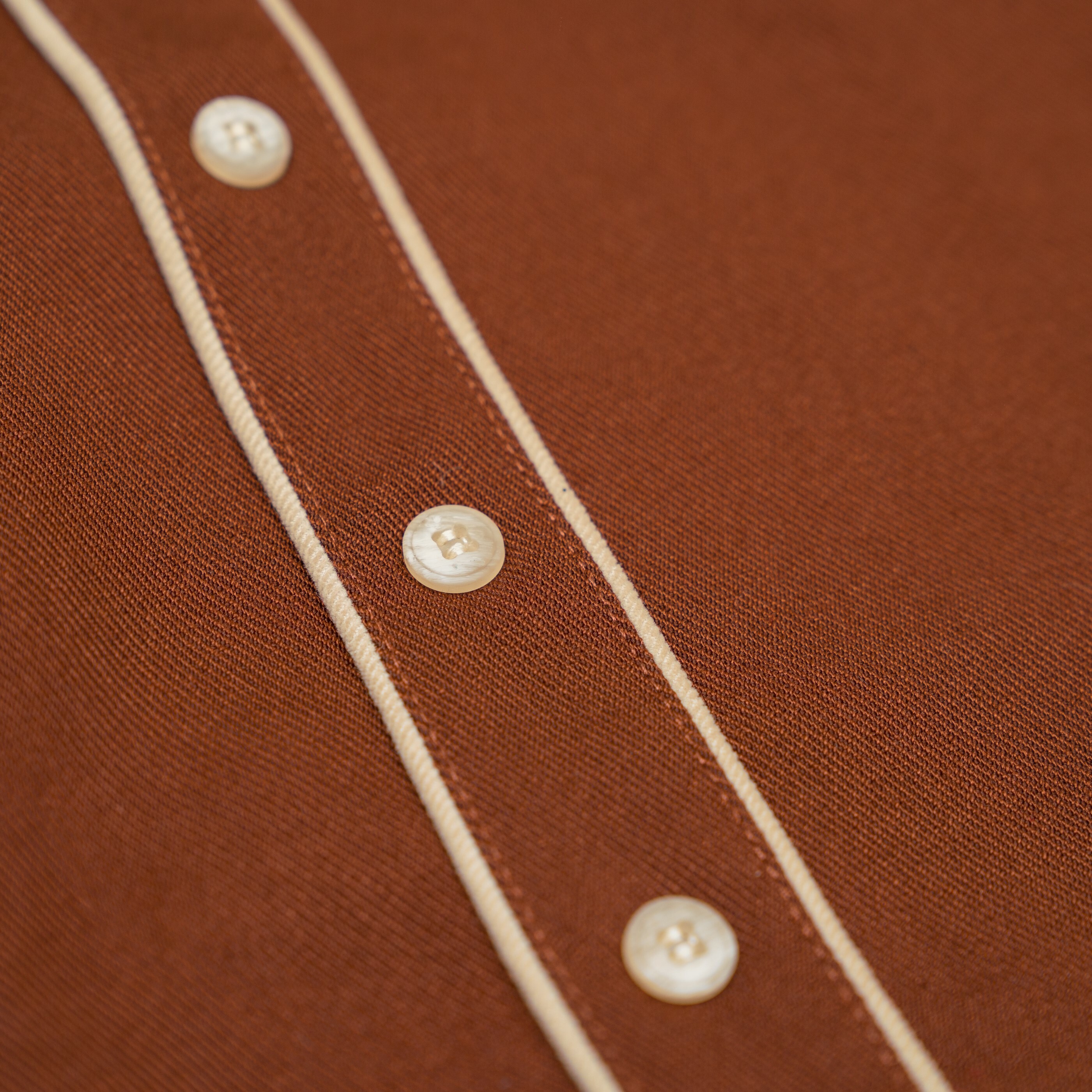 秋款優雅排扣Ａ字短裙(焦糖色)-扣子細節