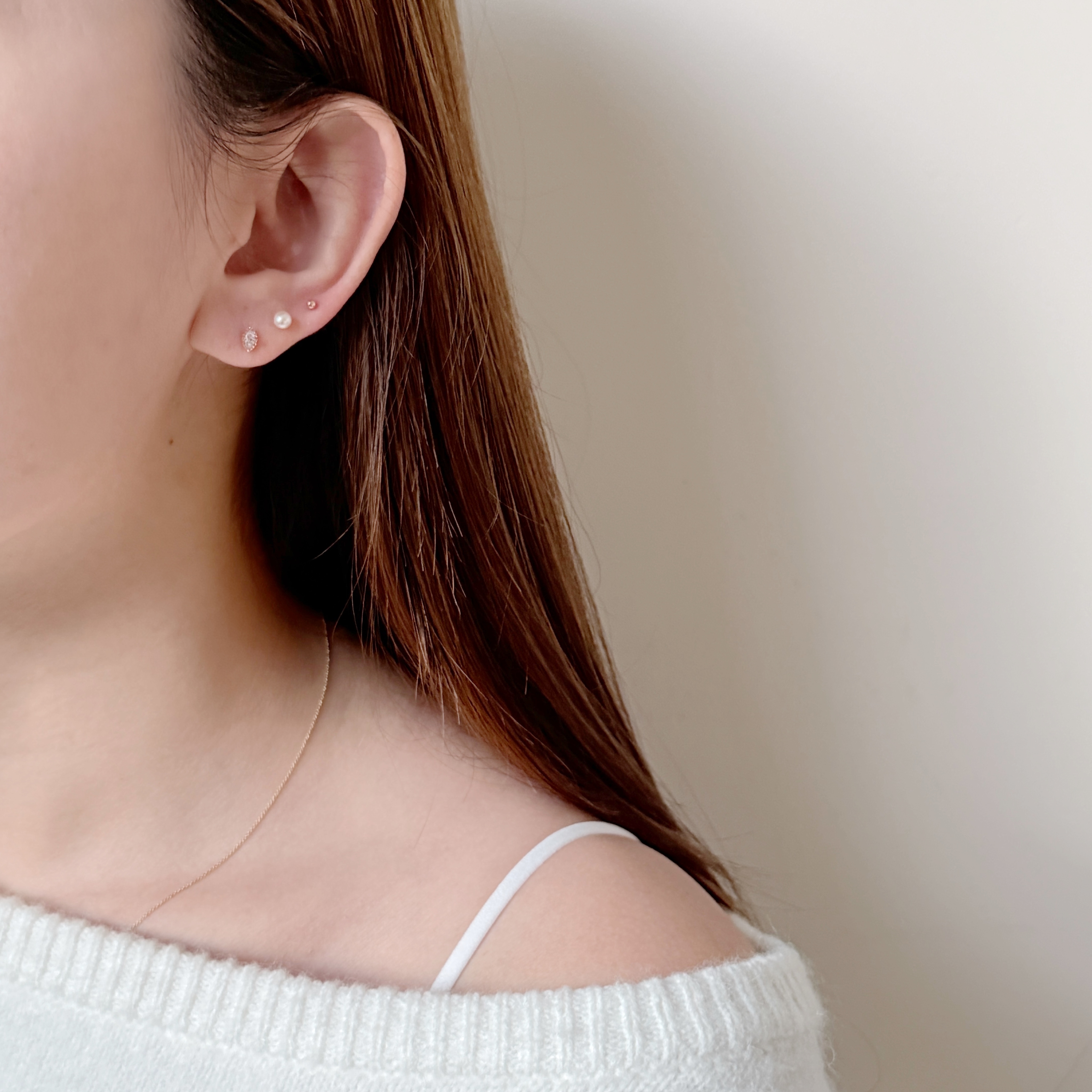 10K蛋糕四爪眼形鋯石耳環