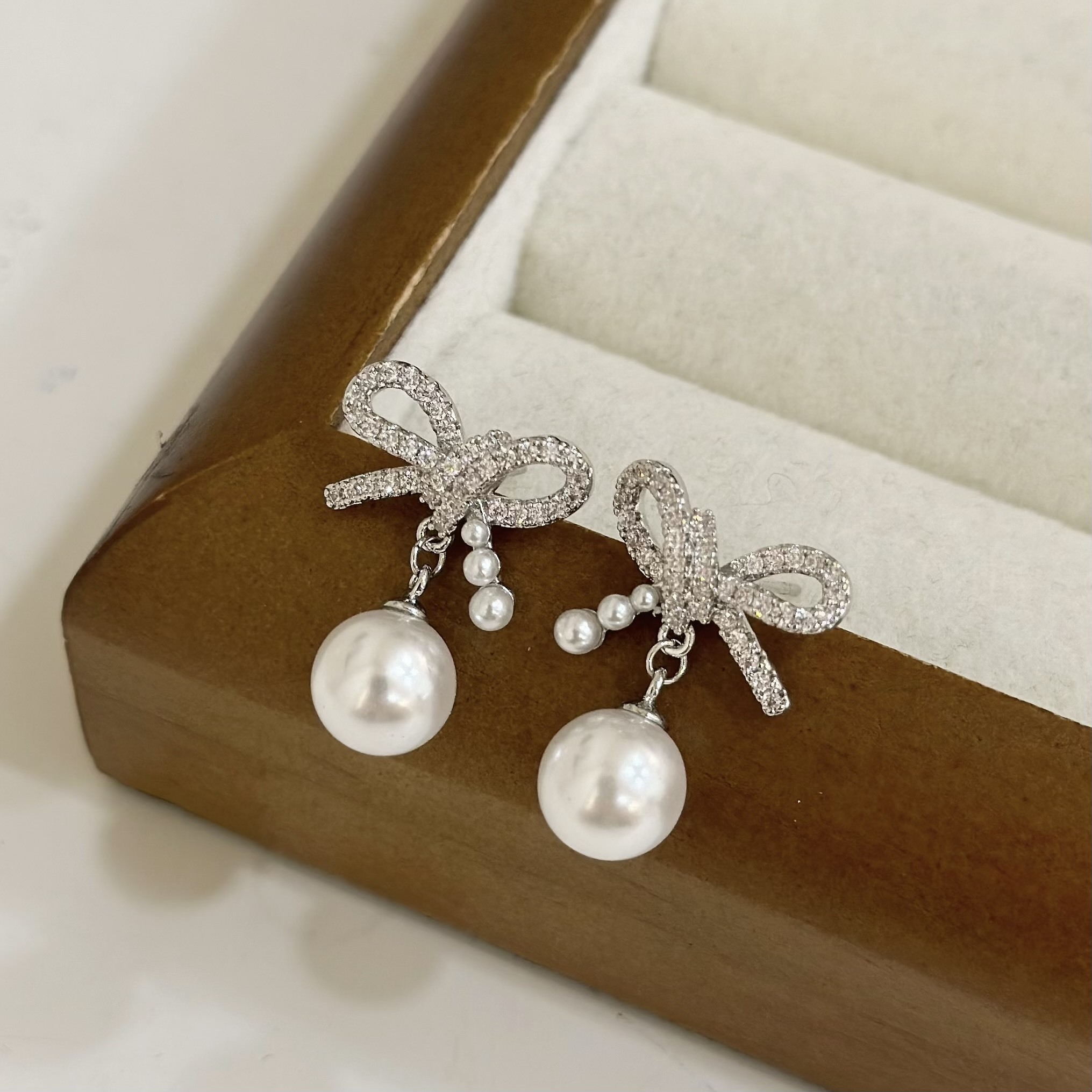 554滿鑽蝴蝶結珍珠垂吊