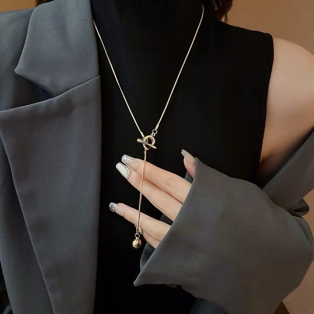 經典OT扣”金銀長蛇骨垂墜毛衣鏈