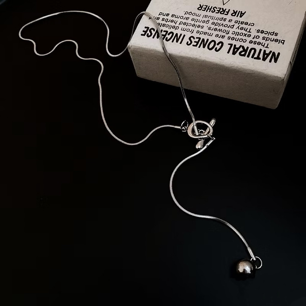 經典OT扣”金銀長蛇骨垂墜毛衣鏈