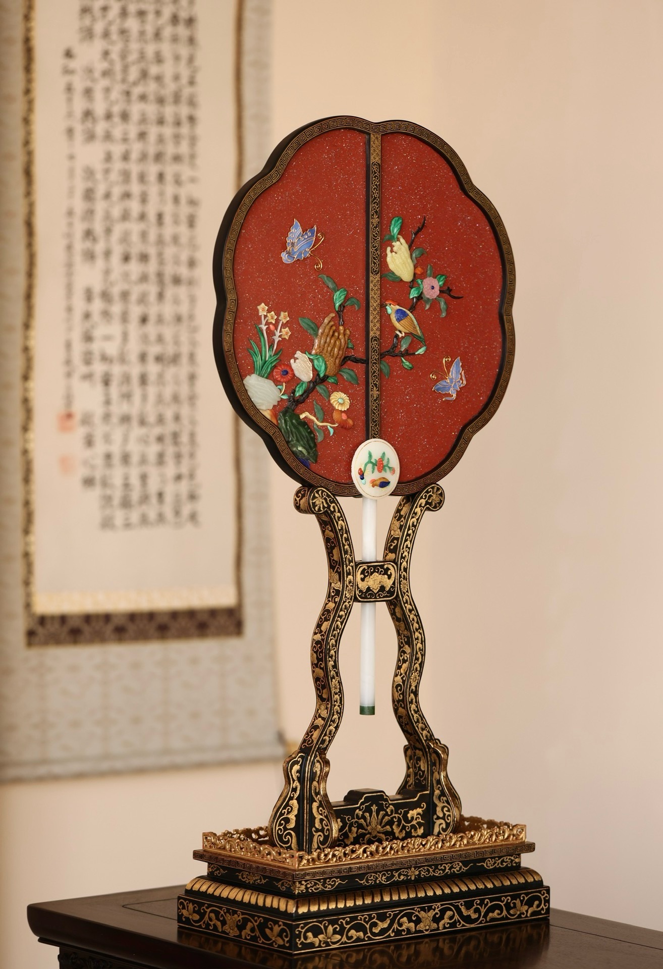 "Palace Fan of Fortune and Longevity" painted with gold and inlaid with treasures on lacquer background