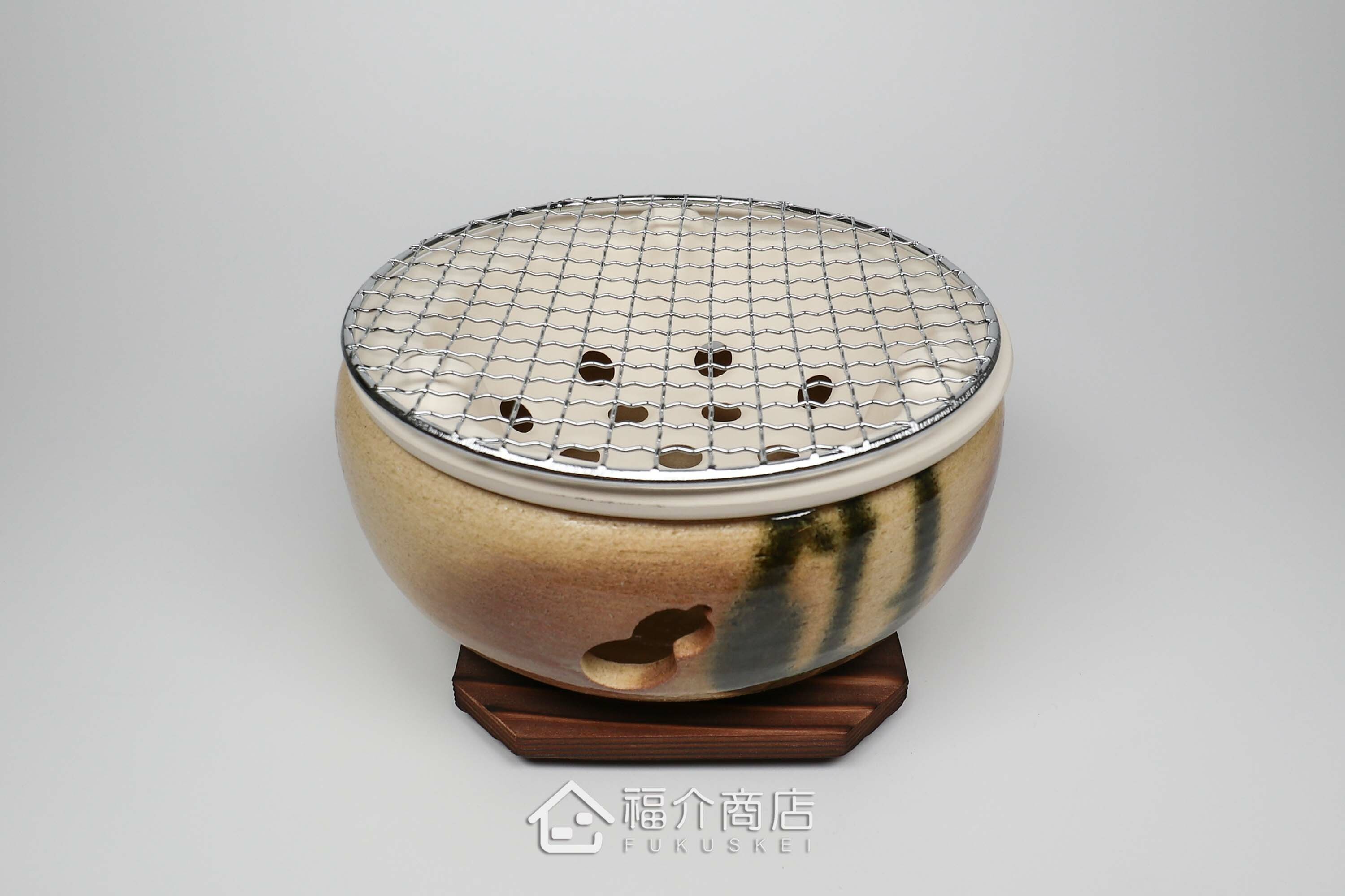 烹調烤肉、烤海鮮用的陶瓷材質水炭烤爐