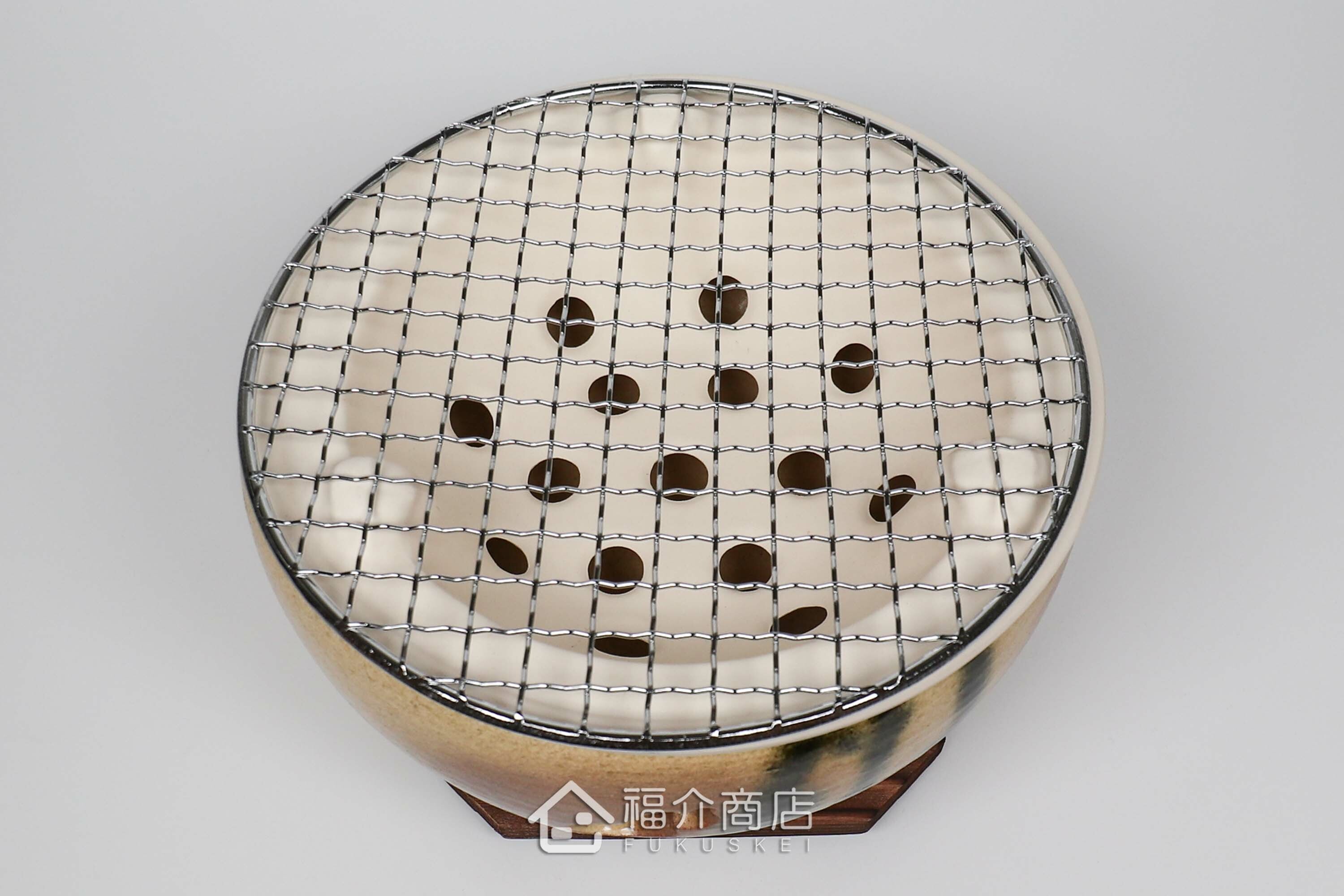 烹調烤肉、烤海鮮用的陶瓷材質水炭烤爐