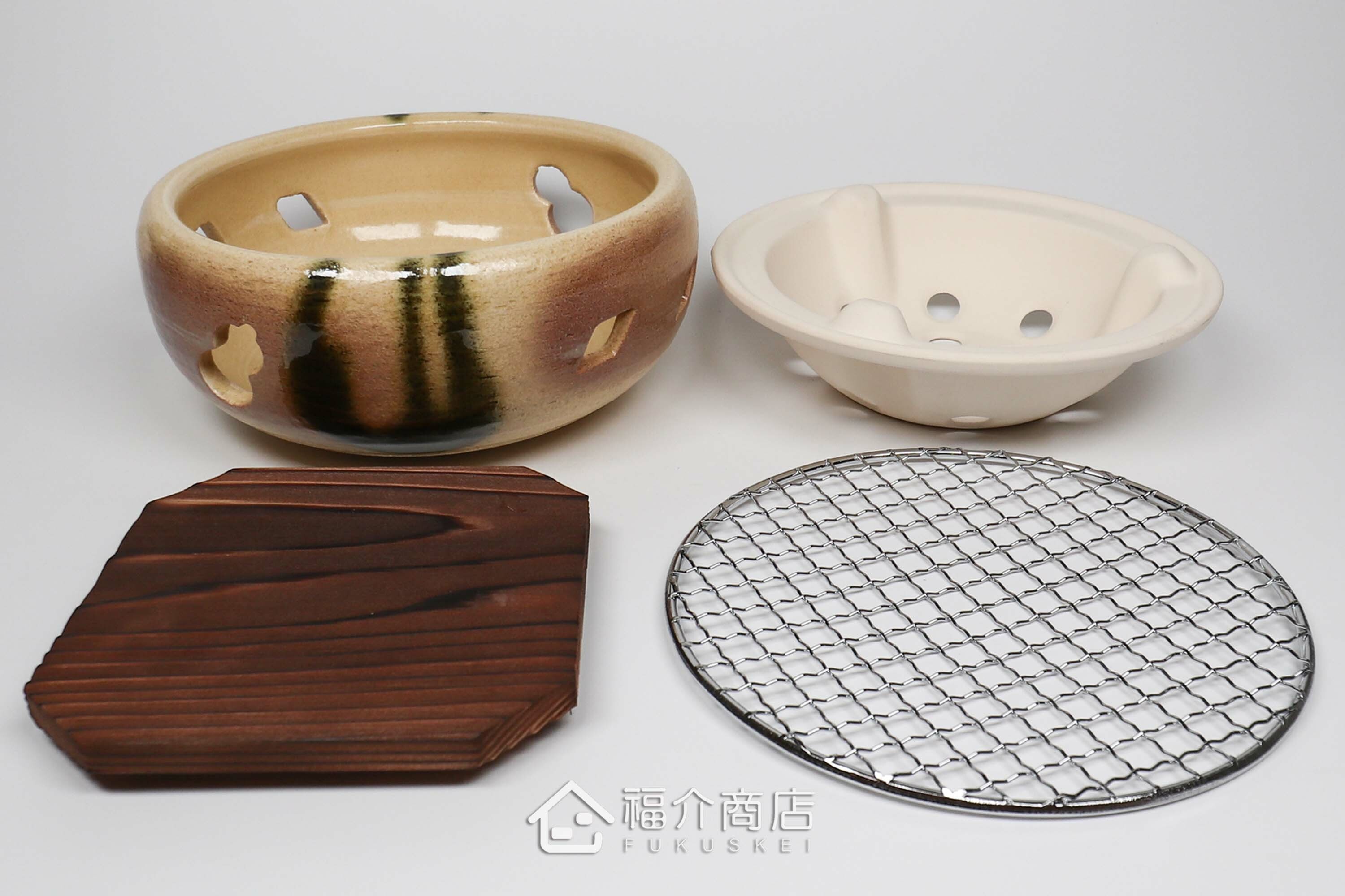 烹調烤肉、烤海鮮用的陶瓷材質水炭烤爐