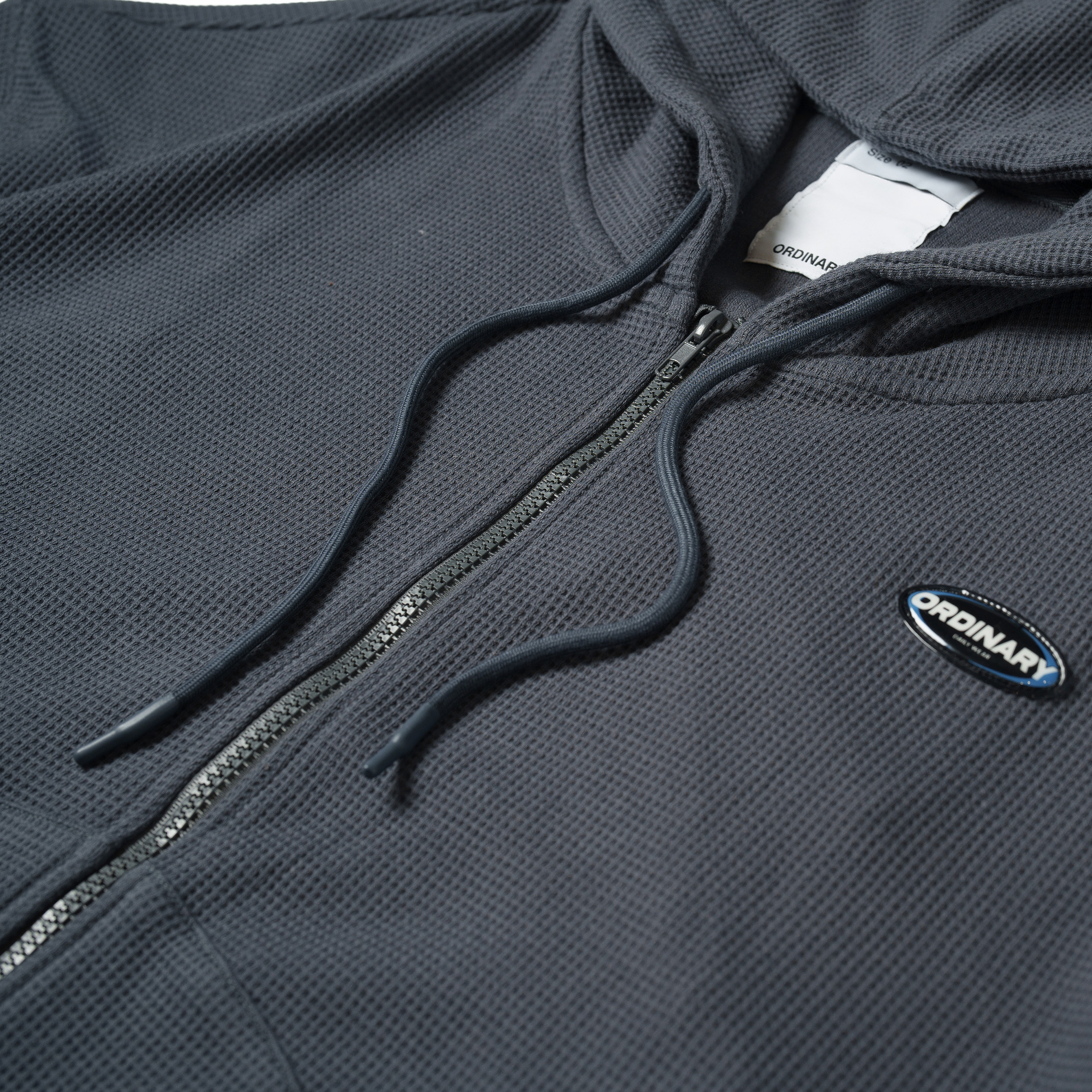 Ordinary 重磅華服格短版帽拉外套