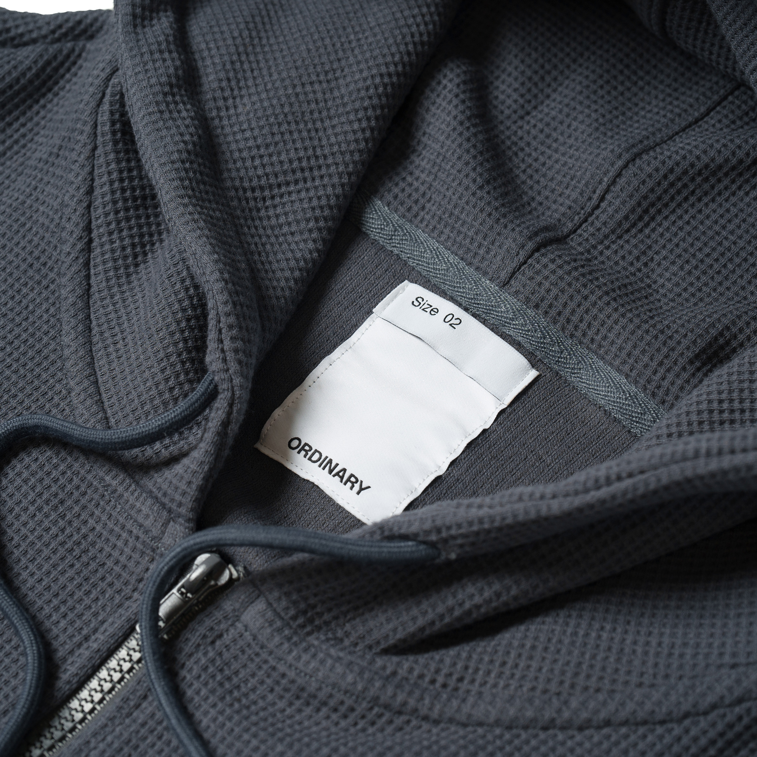 Ordinary 重磅華服格短版帽拉外套