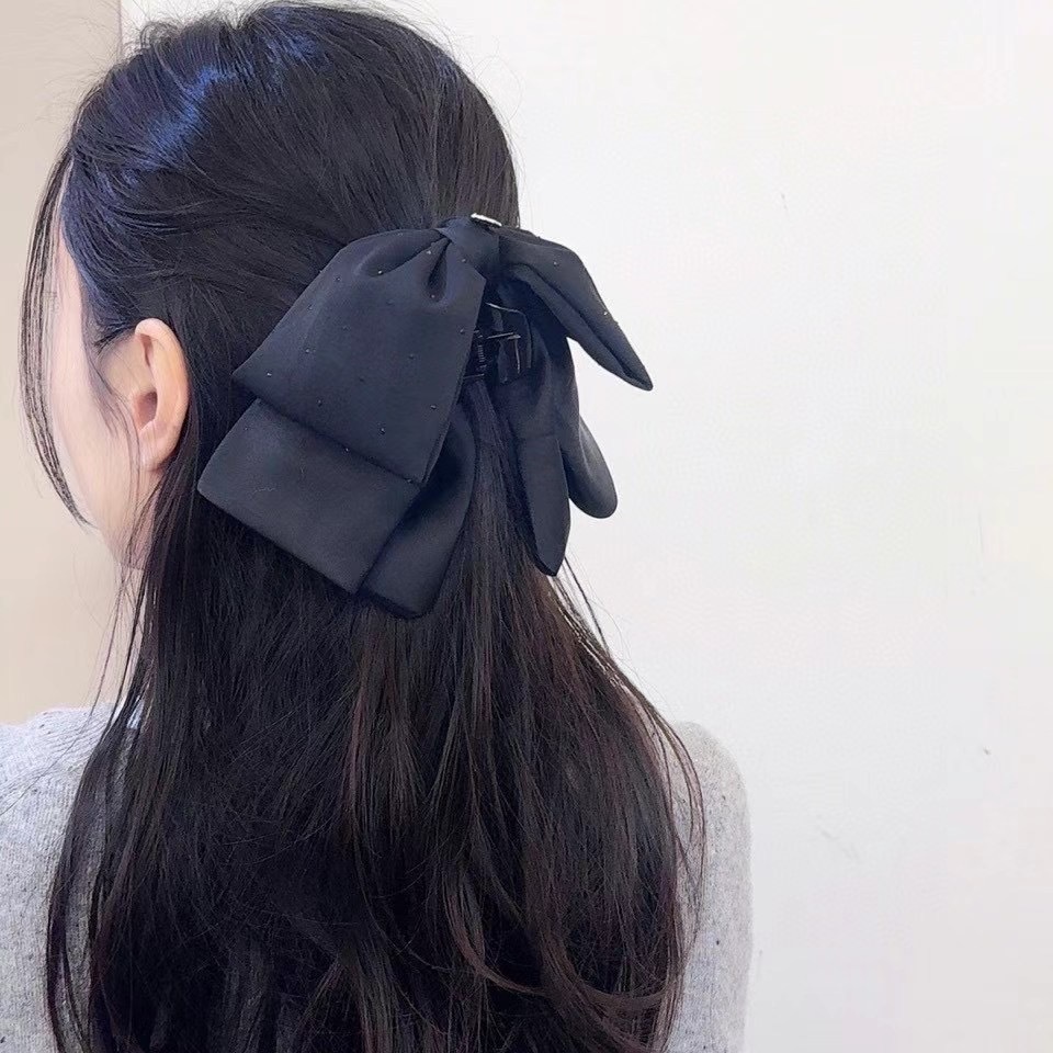 鉚釘蝴蝶結垂墜抓夾