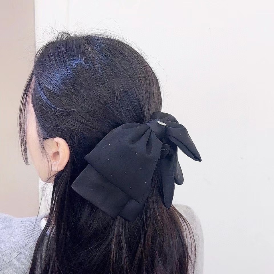 鉚釘蝴蝶結垂墜抓夾