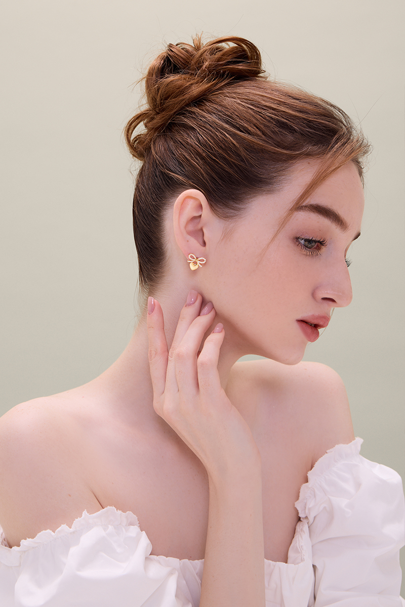 蝴蝶結愛心。夾式耳環