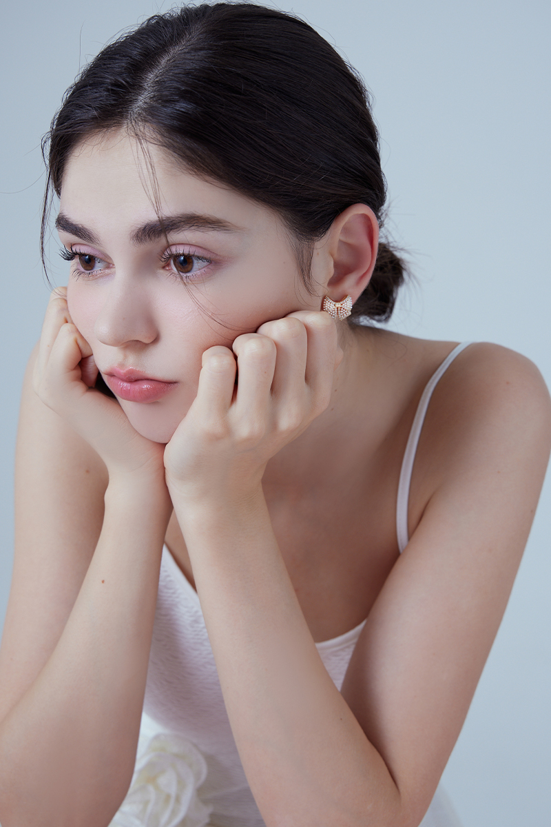 璀燦蝴蝶結。銀針耳環