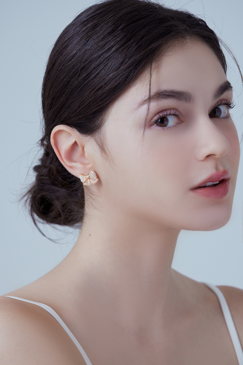 璀燦蝴蝶結。銀針耳環