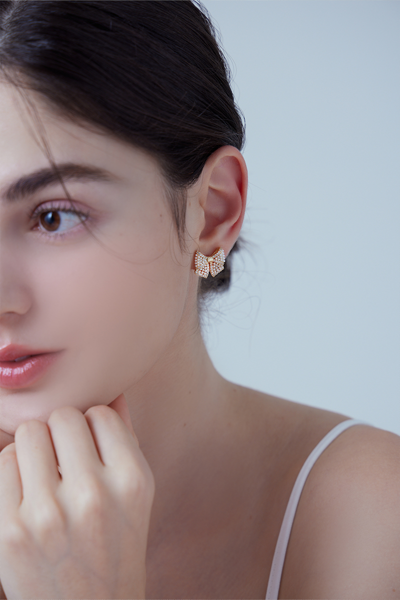 璀燦蝴蝶結。夾式耳環