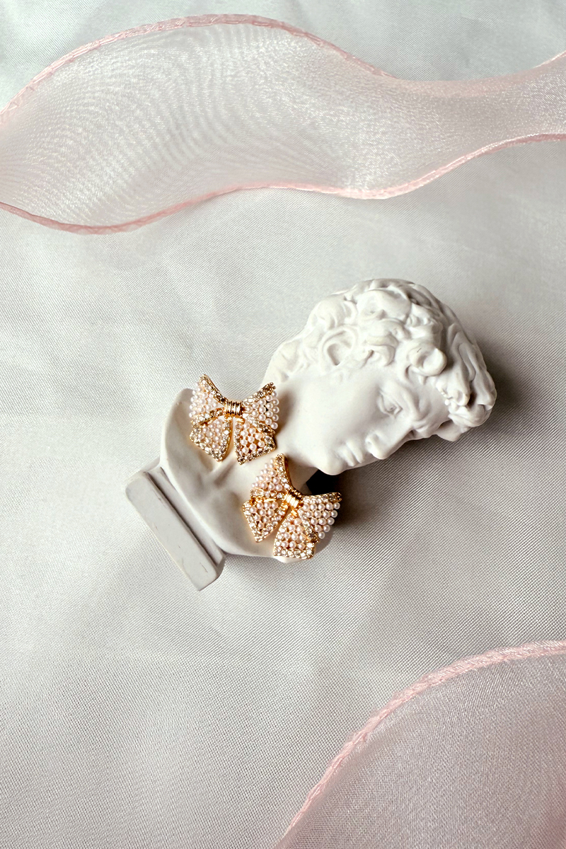 璀燦蝴蝶結。夾式耳環