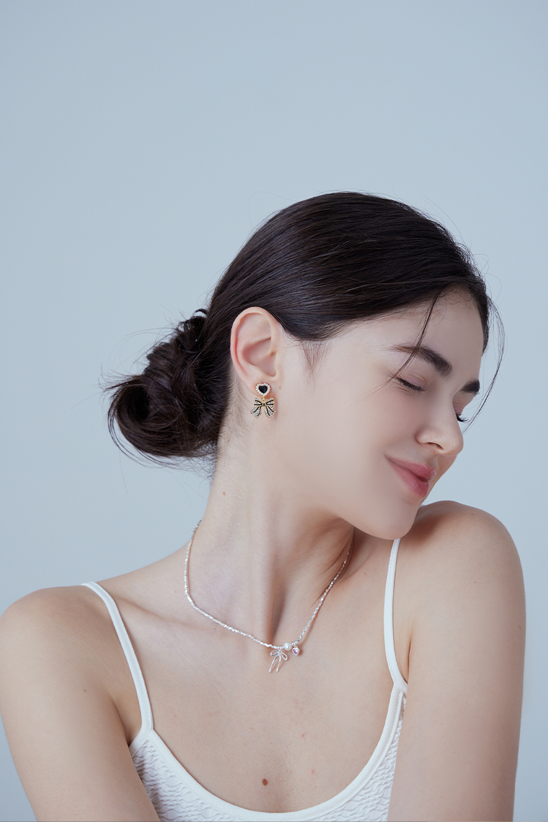 法式輕奢愛心珍珠鋯石蝴蝶結。夾式耳環