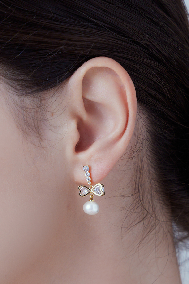 仙氣鋯石蝴蝶結。銀針耳環