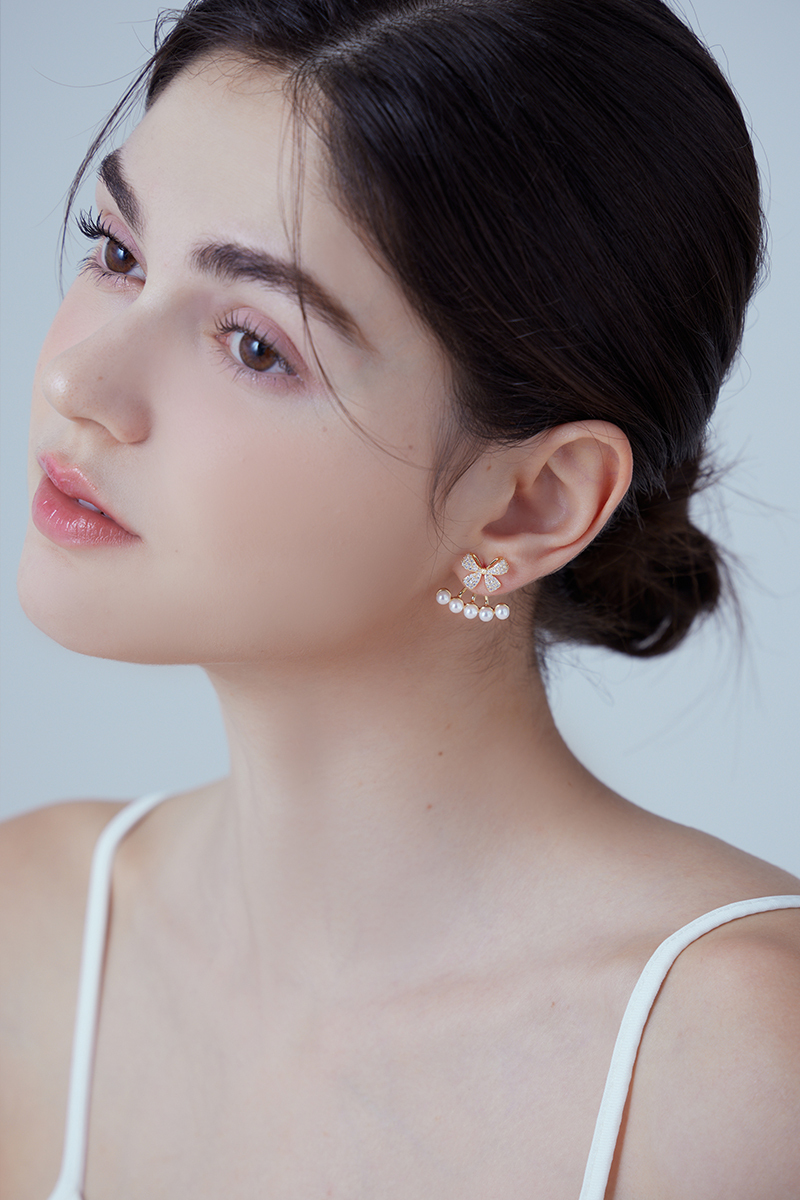 優雅蝴蝶結珍珠。針式耳環