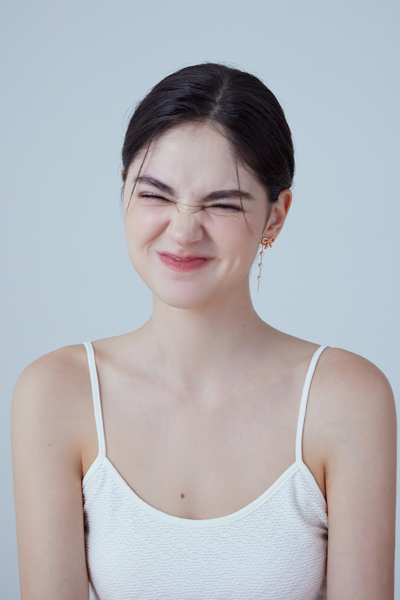 仙緣鋯石蝴蝶結垂墜珍珠。夾式耳環