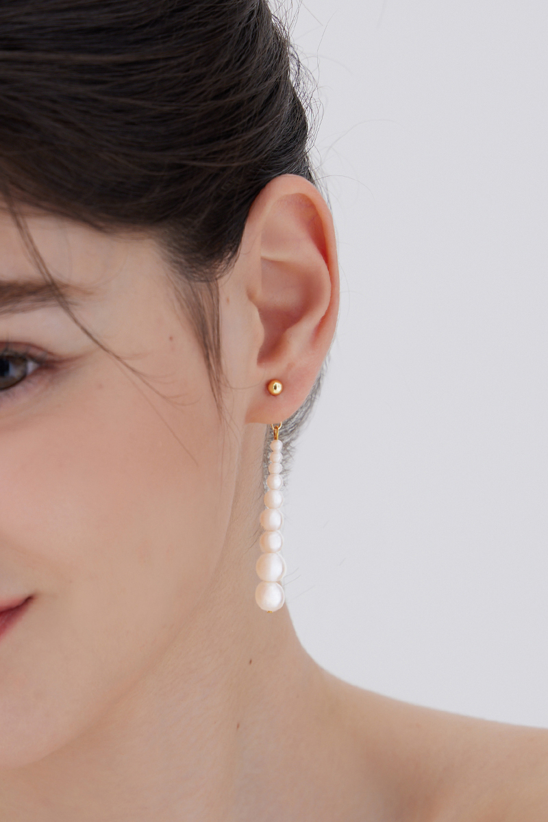 漸層垂墜珍珠。銀針耳環