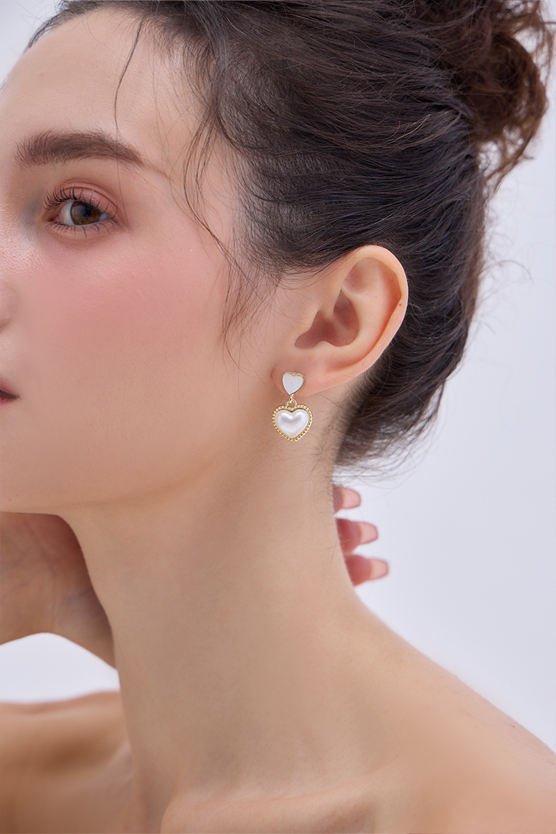 心心相印。銀針耳環