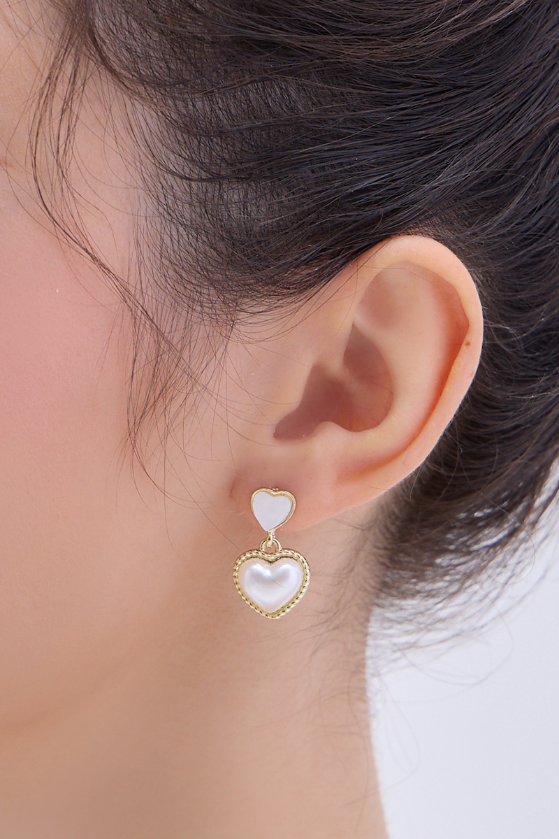 心心相印。夾式耳環