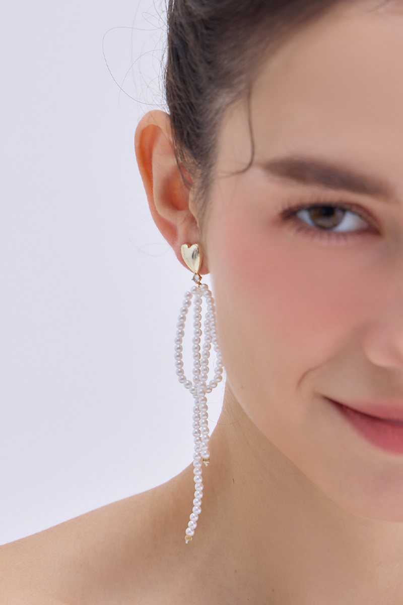愛心珍珠流蘇。銀針耳環
