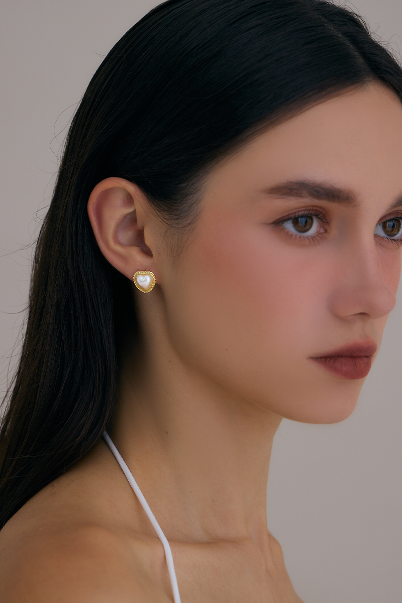 珍珠愛心語。夾式耳環