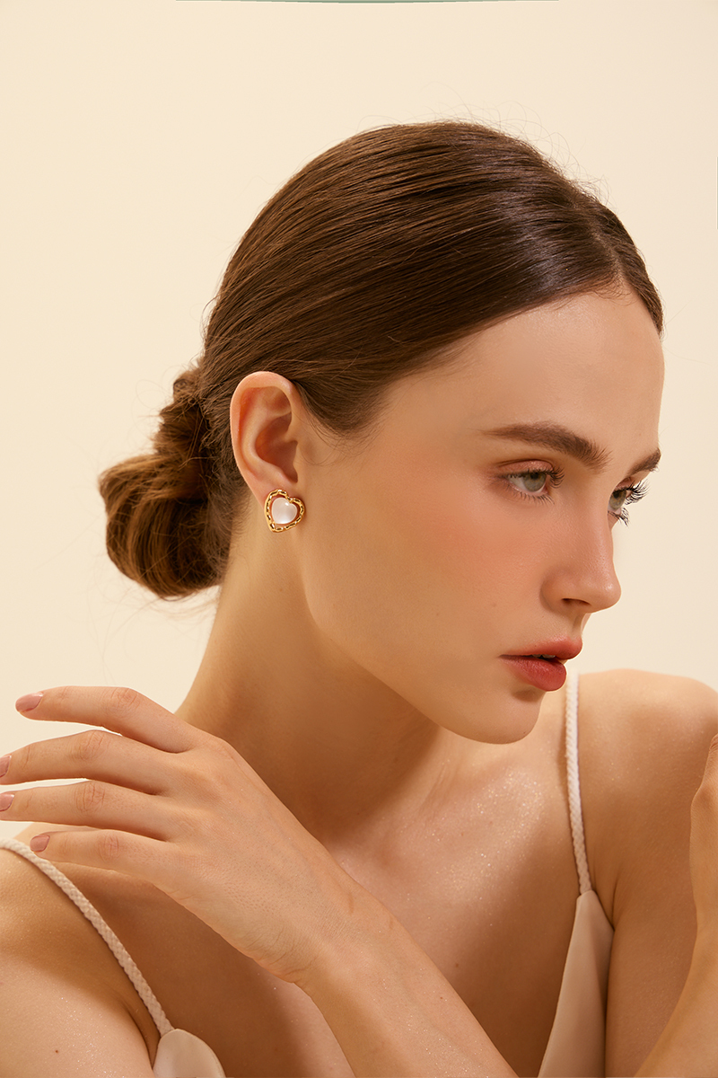 金屬貓眼愛心。夾式耳環