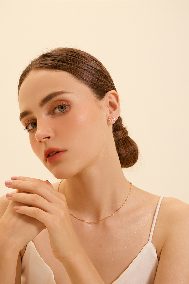 【925純銀】鏤空蝴蝶結。銀針耳環