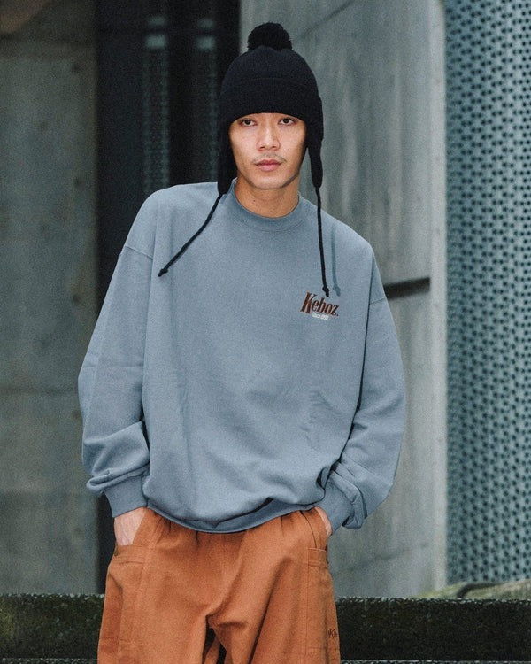 KEBOZ EARFLAP POM BEANIE