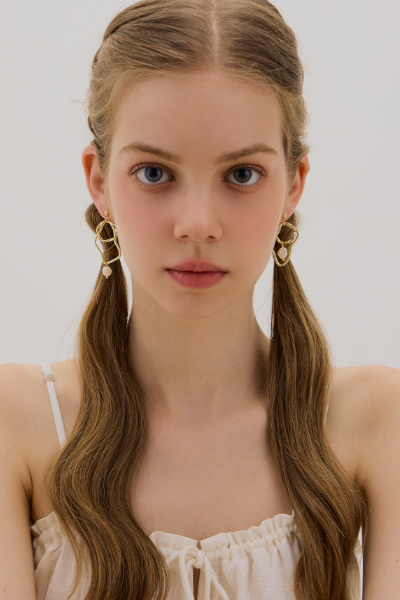 不規則珍珠耳墜。銀針耳環