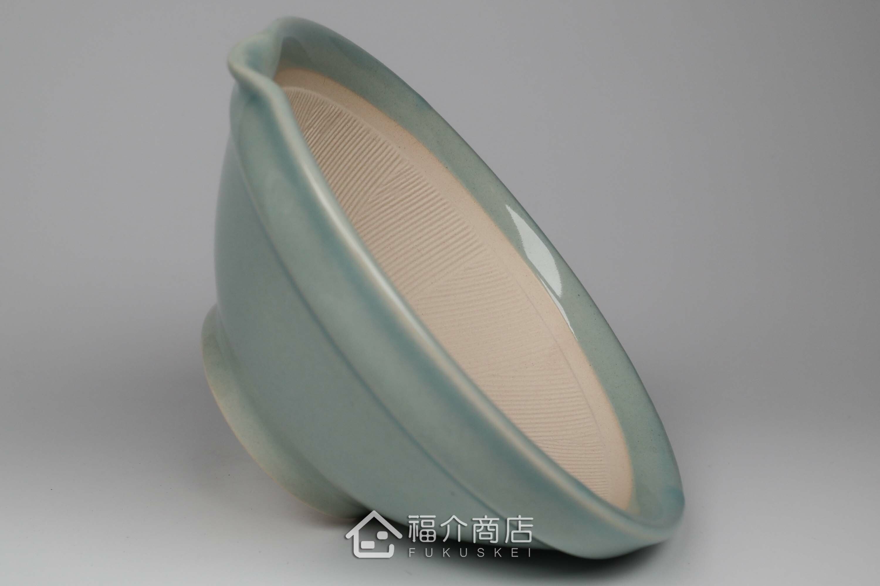 將食材搗碎研磨用的研磨缽、研磨板、竹刷與木杵的4件組合